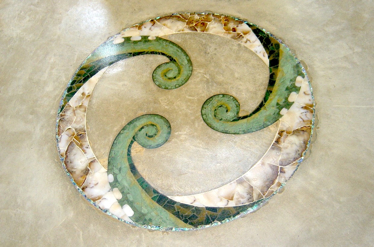 Private Commission Stone inlay artwork: A kiwi koru design created with pietra dura technique, neutral hue, featuring semiprecious stones, 3 grades of authentic Pounamu New Zealand greenstone, jade, and paua shell seamlessly embedded into a polished cement floor. Collab Michele Bluck & Eddie