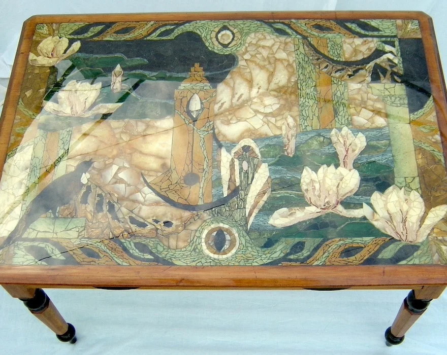 Pietra Dura Stone Artwork, a labour of love of semiprecious stones and glass inlaid, and mosaic in a table. Floating magnolia, hills and rivers, a protective angel a singing Tui, with a magical tower. An original authentic keepsake and eclectic artisan heirloom created by NZ artist Michele Bluck